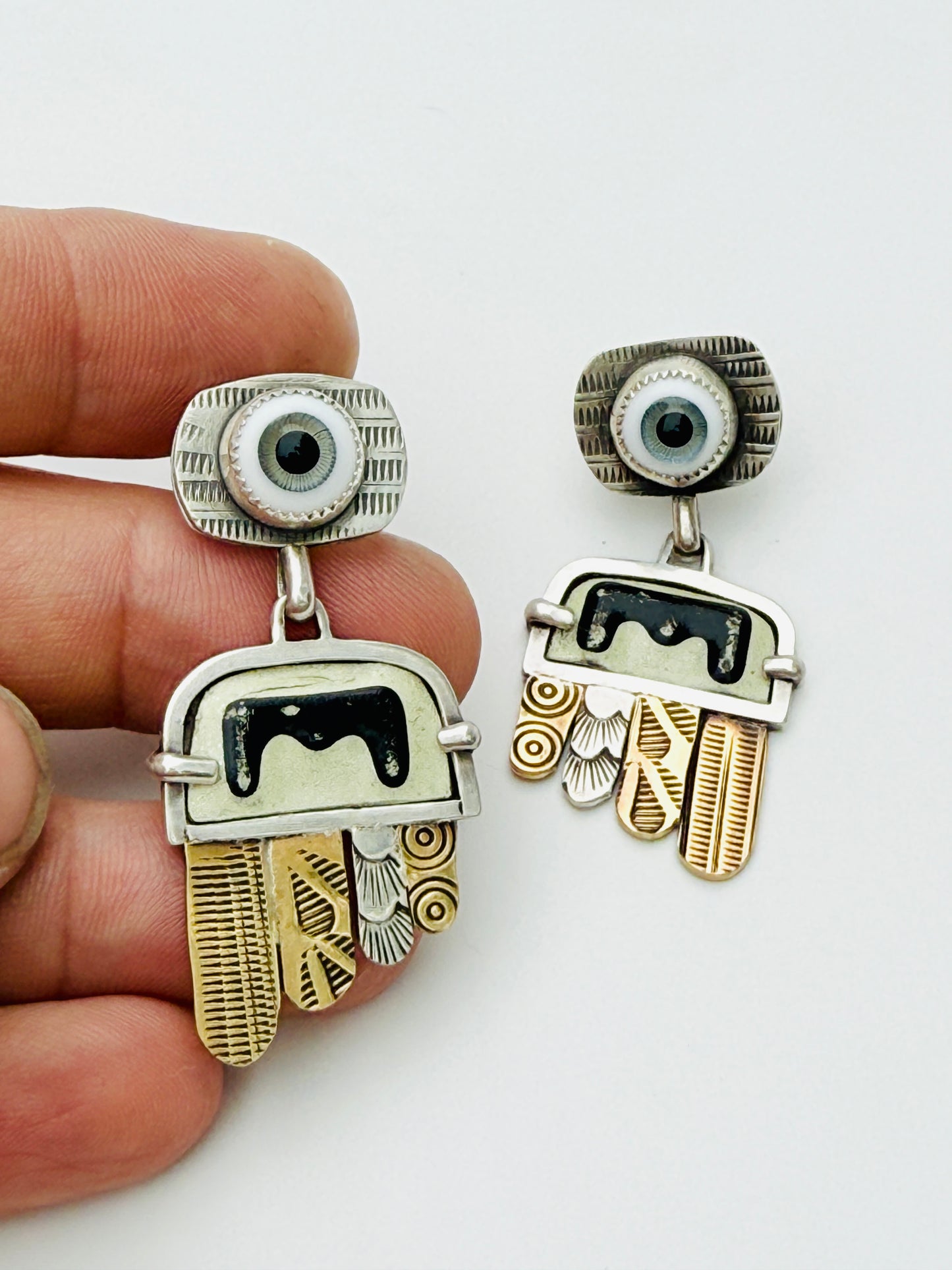 Eyes and wings earrings