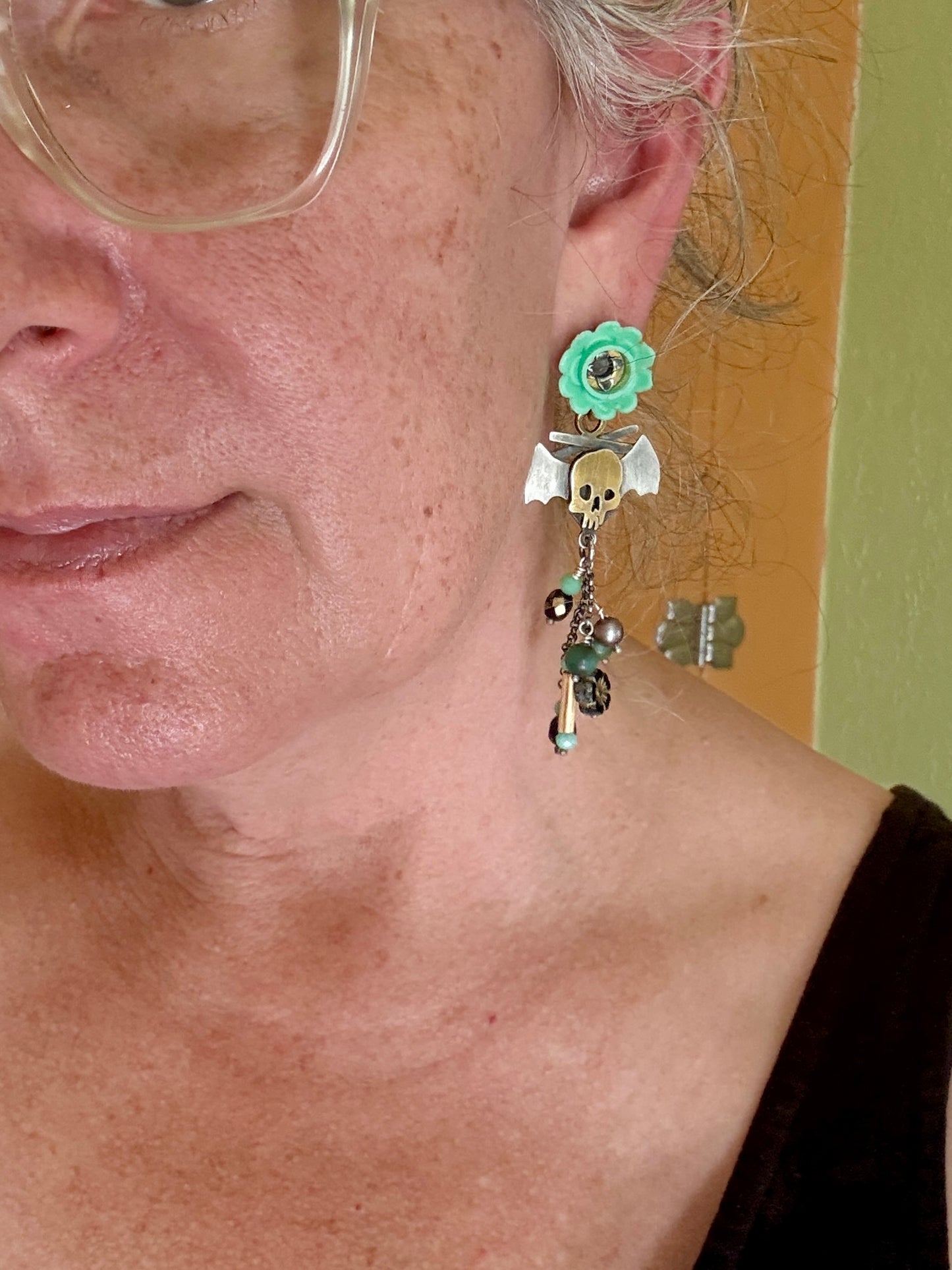 Green gothic tiki earrings