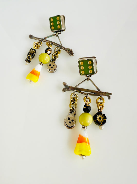 Sterling silver skulls, bones along with glass candy corn beads.