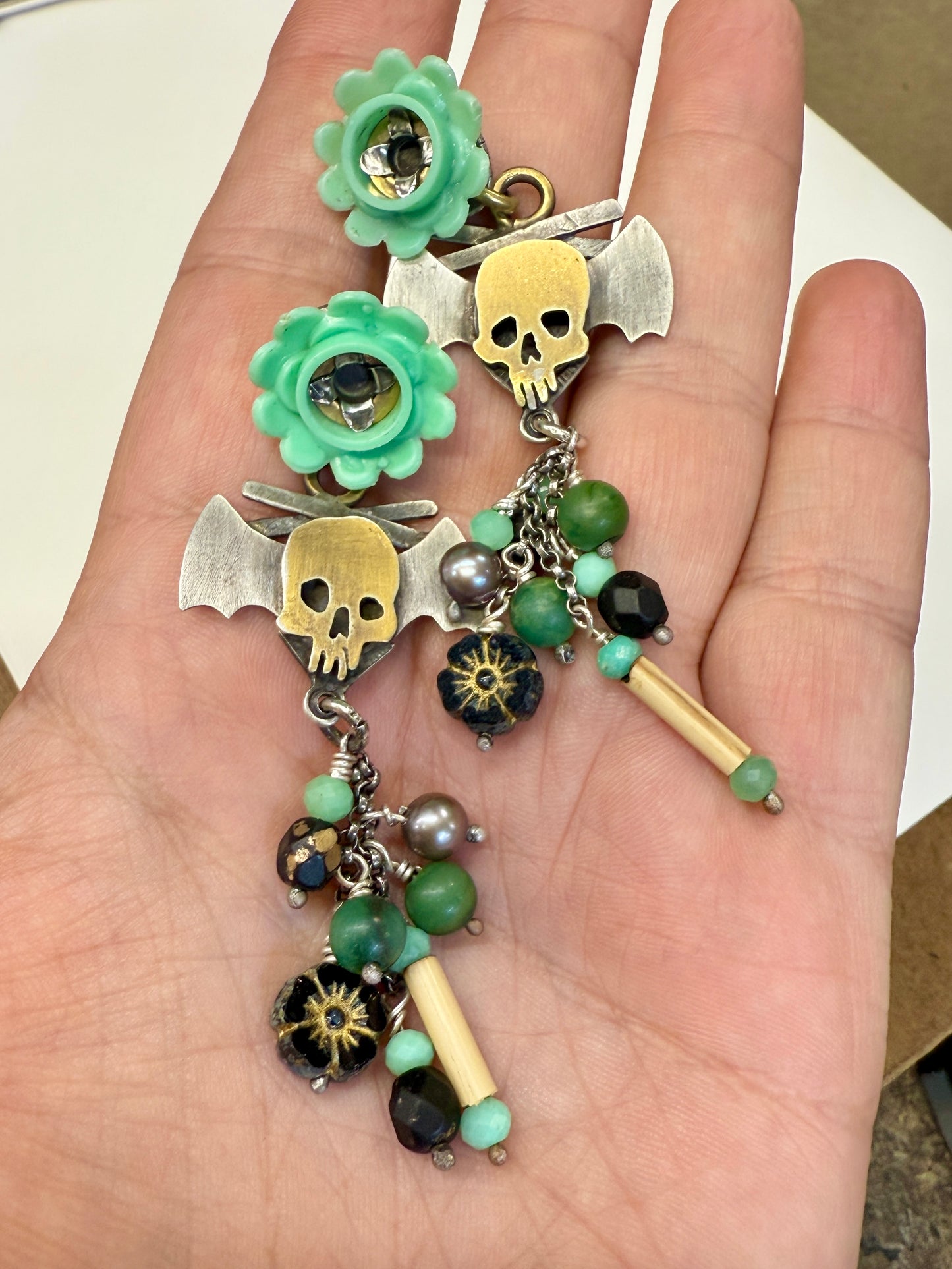 Green gothic tiki earrings