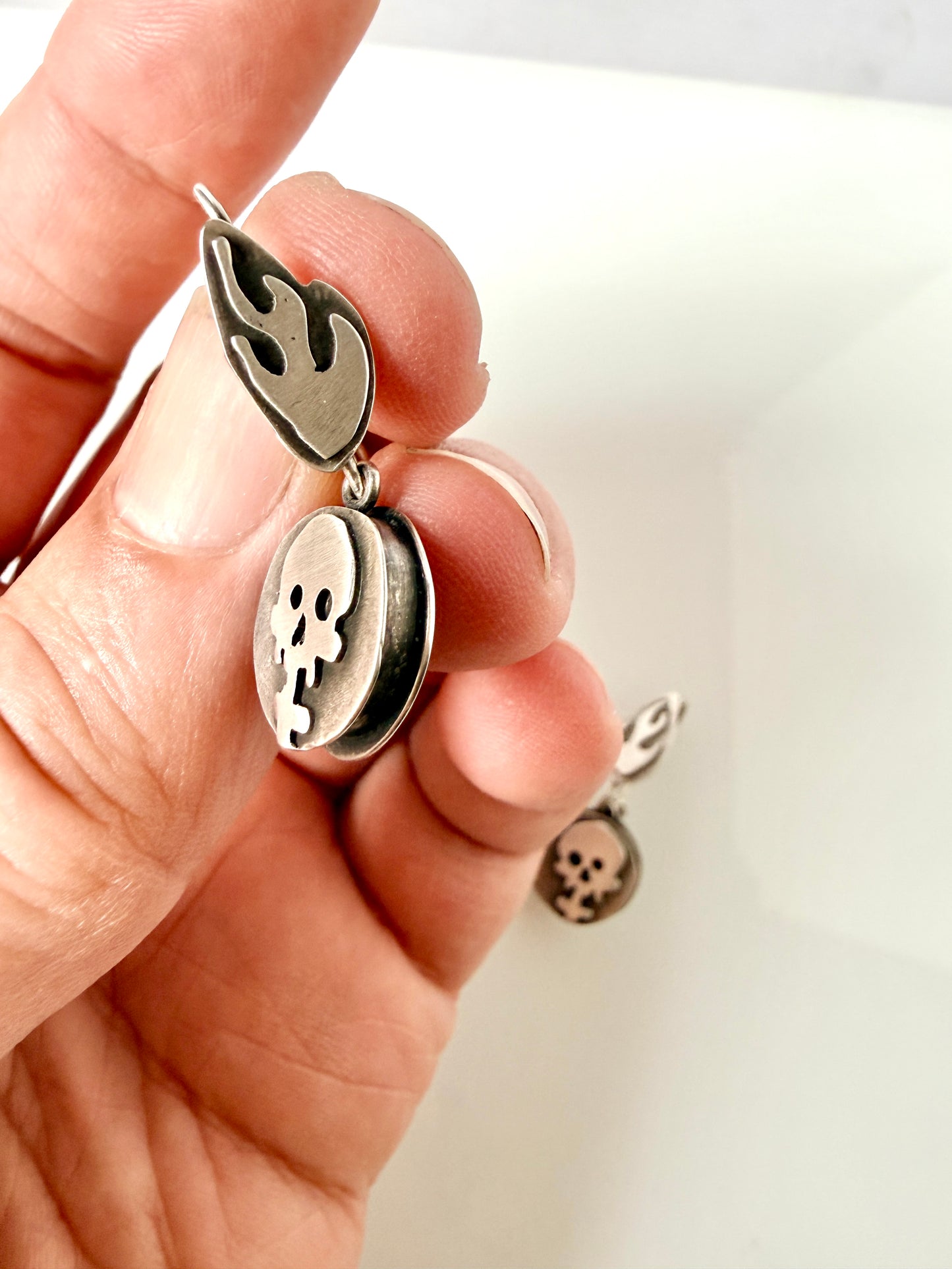 Sterling skull and flame drop earrings