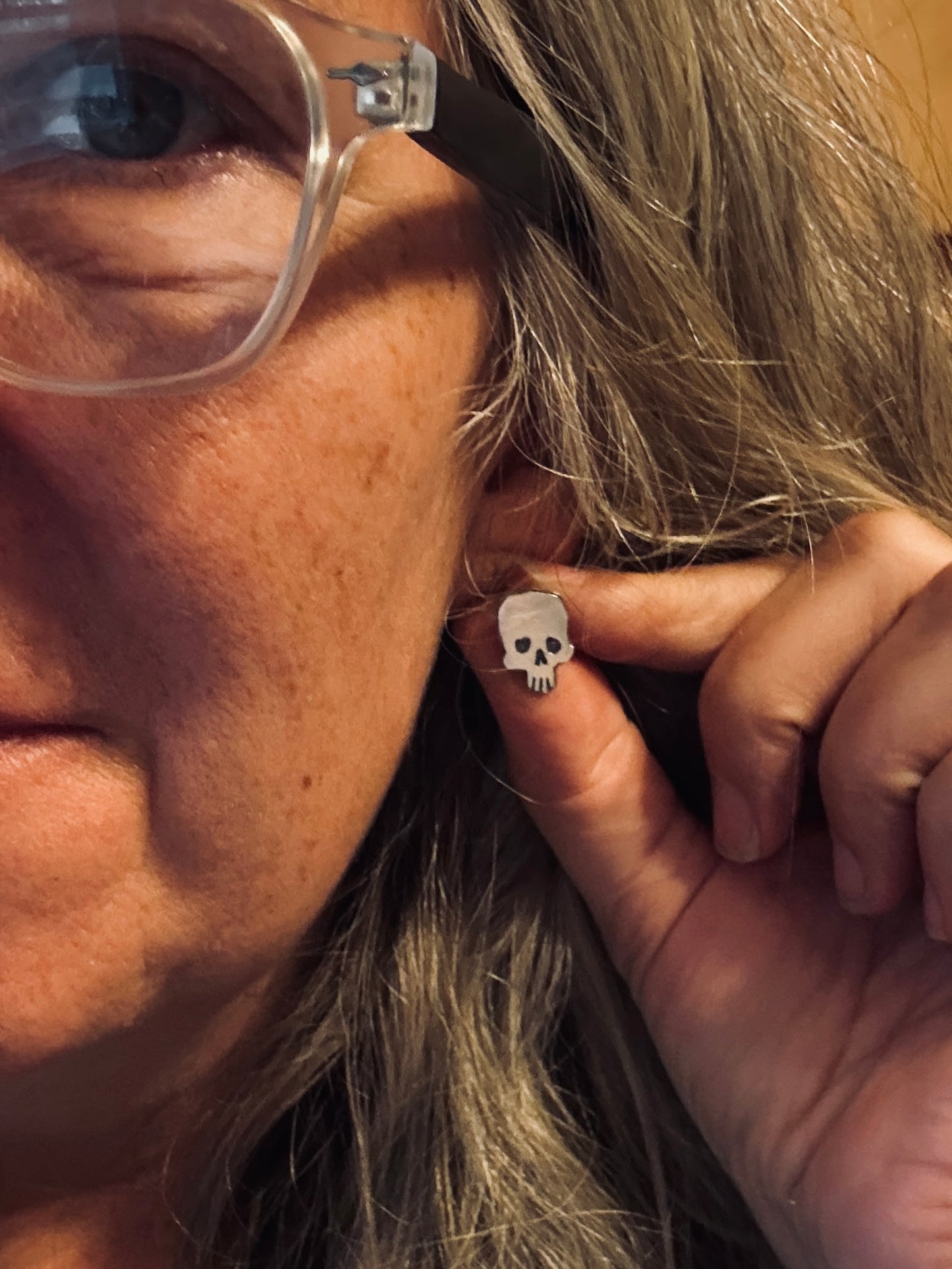 Spooky skull stud earrings