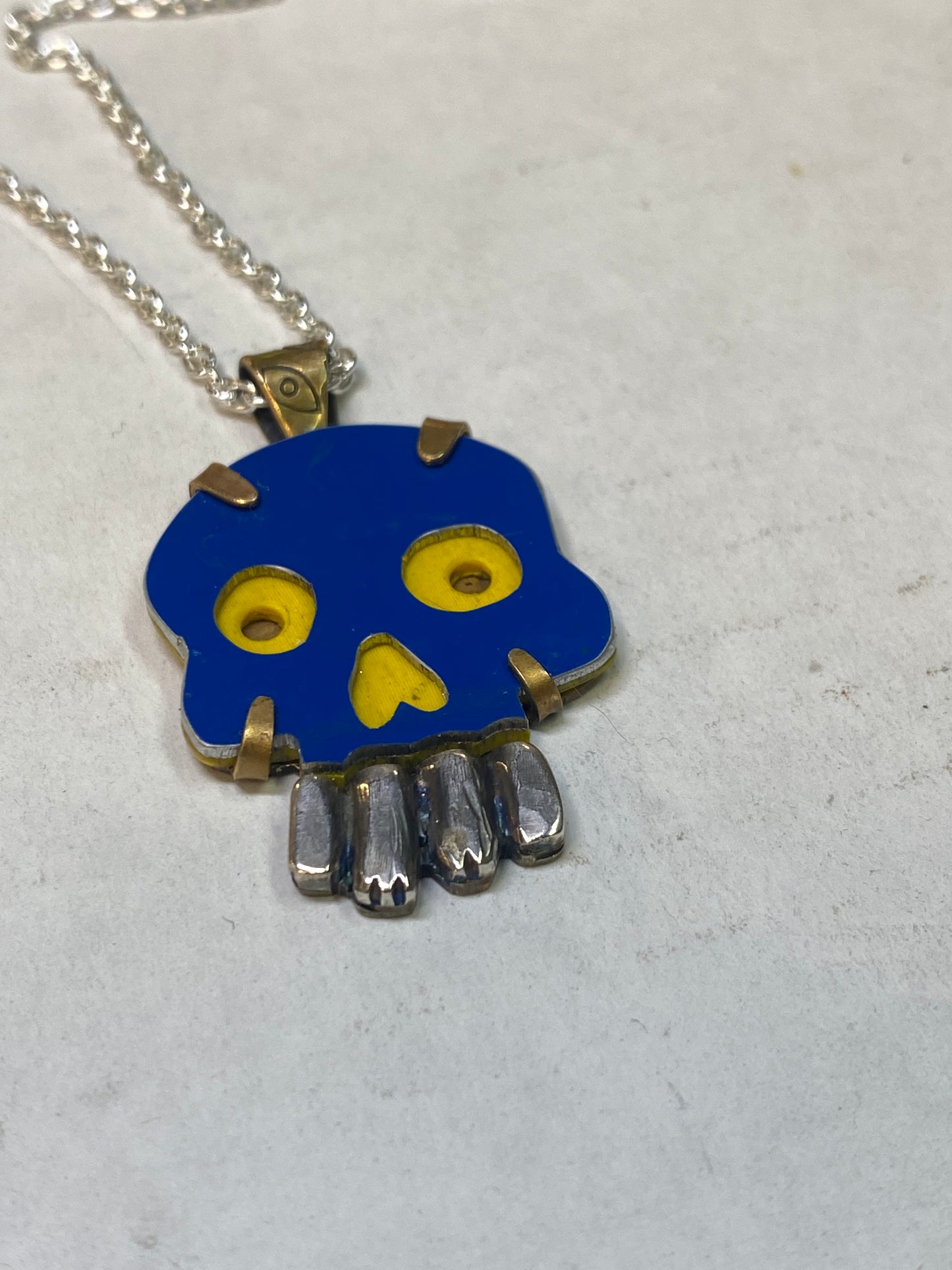 Blue skull pendant