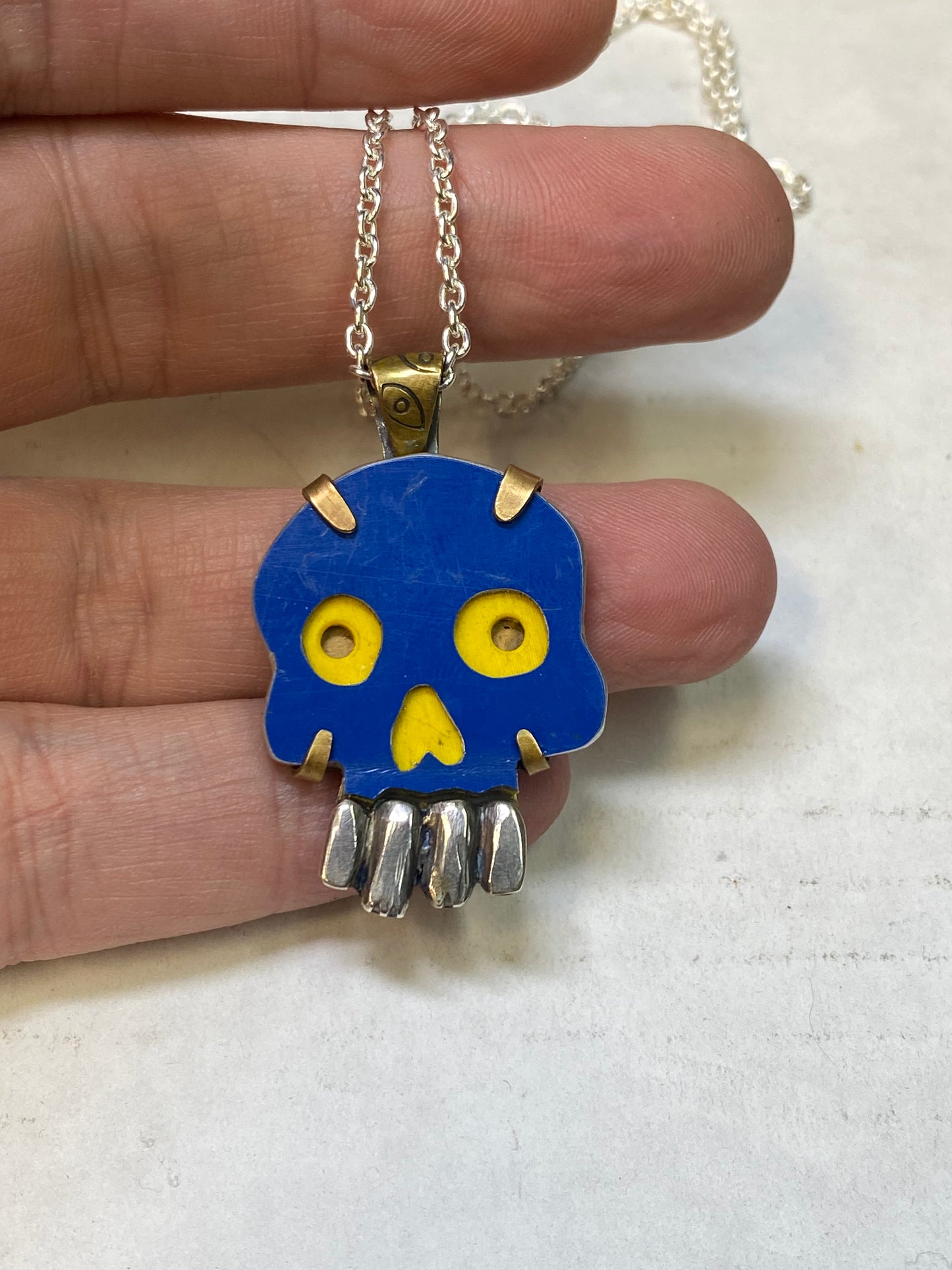 Blue skull pendant