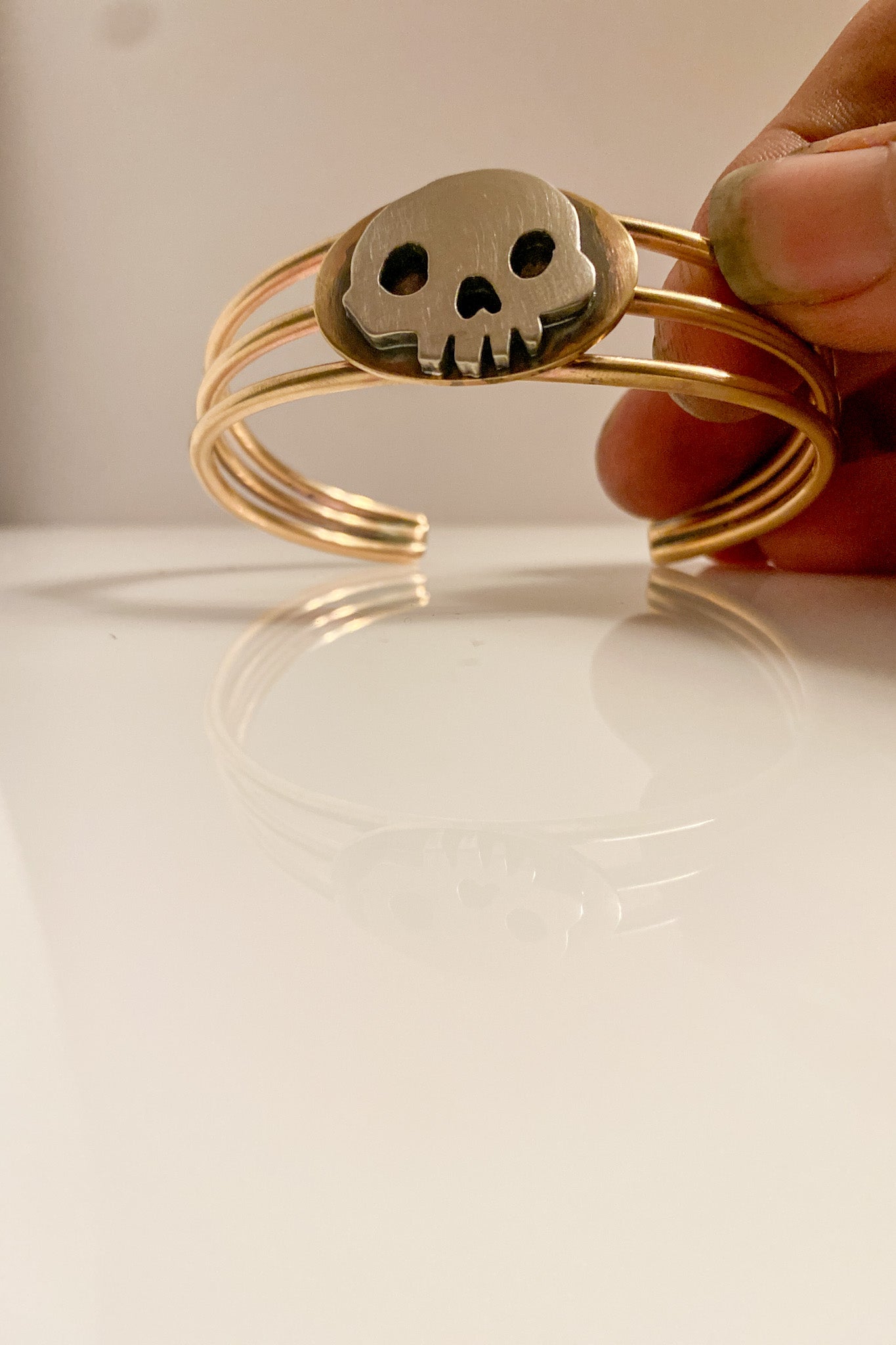 brass cuff with skull